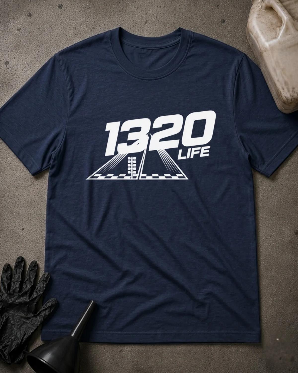 Navy 1320 Life drag racing T-shirt featuring white “1320 Life” lettering above a drag strip graphic with a starting light and checkered line.