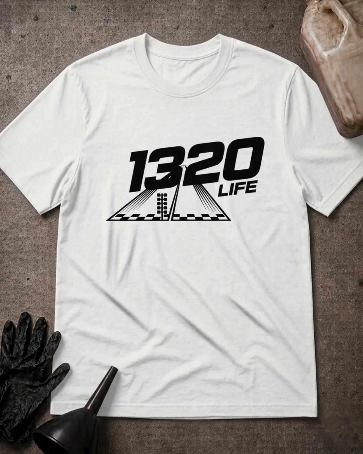 White 1320 Life drag racing T-shirt featuring black “1320 Life” lettering above a drag strip graphic with a starting light and checkered line.