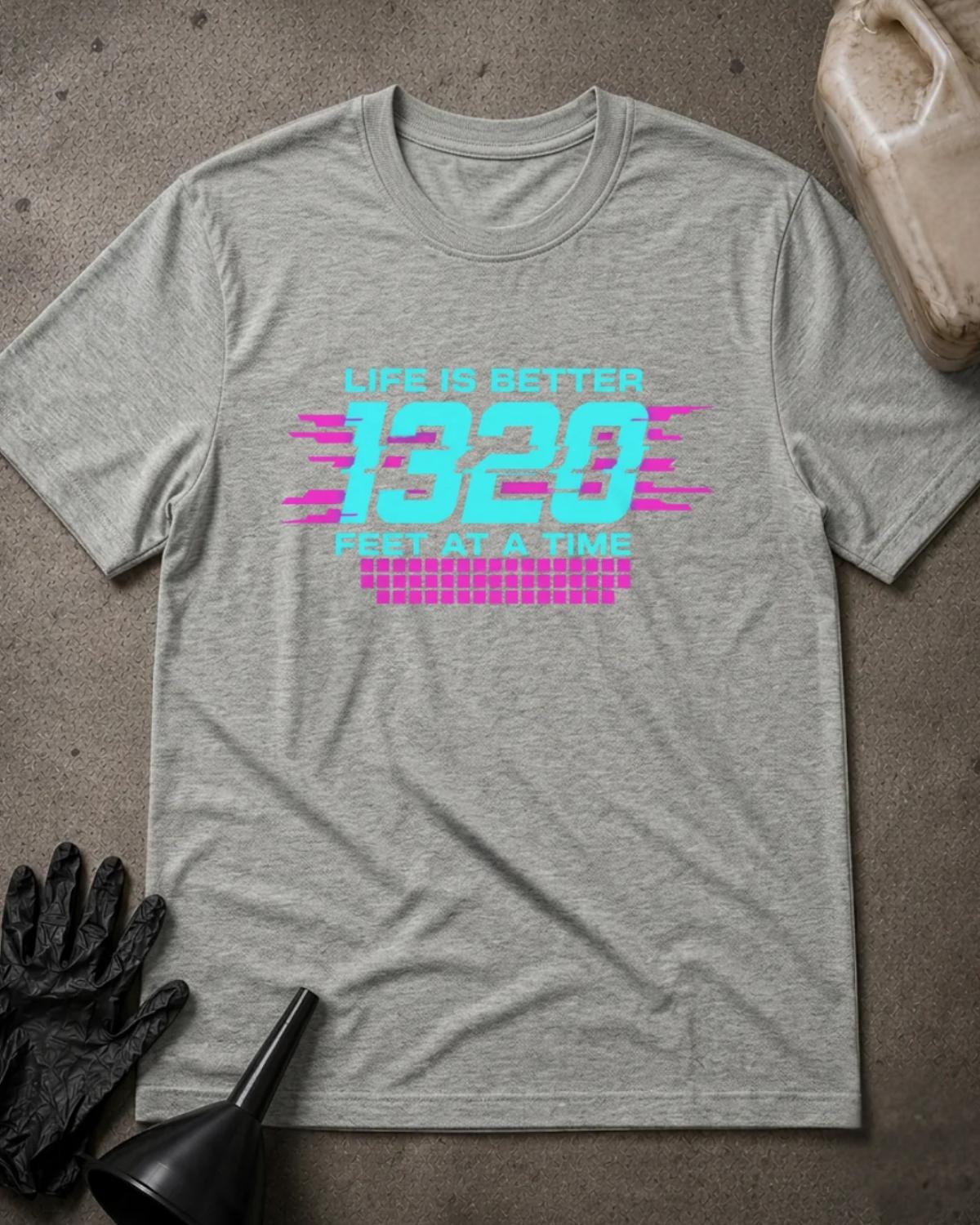 Athletic Heather gray 1320 Neon drag racing T-shirt featuring turquoise “Life is better 1320 feet at a time” lettering with magenta speed lines and a grid pattern.