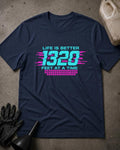 Navy 1320 Neon drag racing T-shirt featuring turquoise “Life is better 1320 feet at a time” lettering with magenta speed lines and a grid pattern.