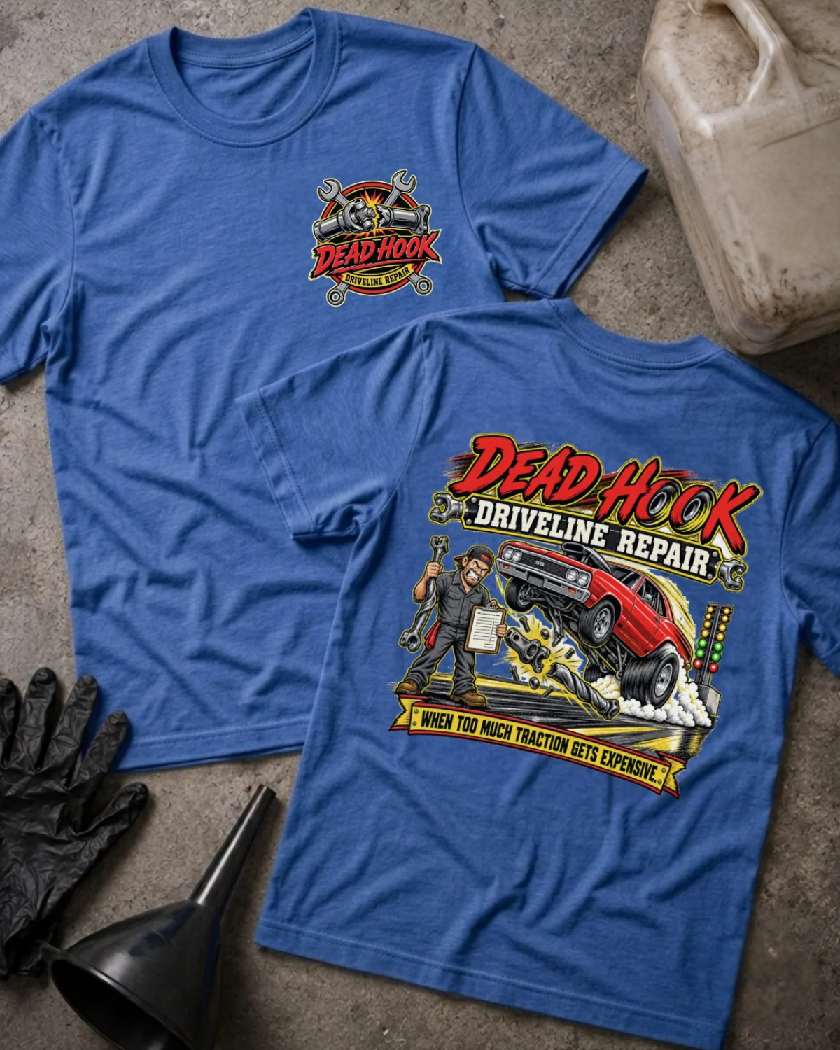 Front and back of heather true royal blue Dead Hook Driveline Repair T-shirt with a small chest logo and red drag car, mechanic and broken driveshaft back graphic.