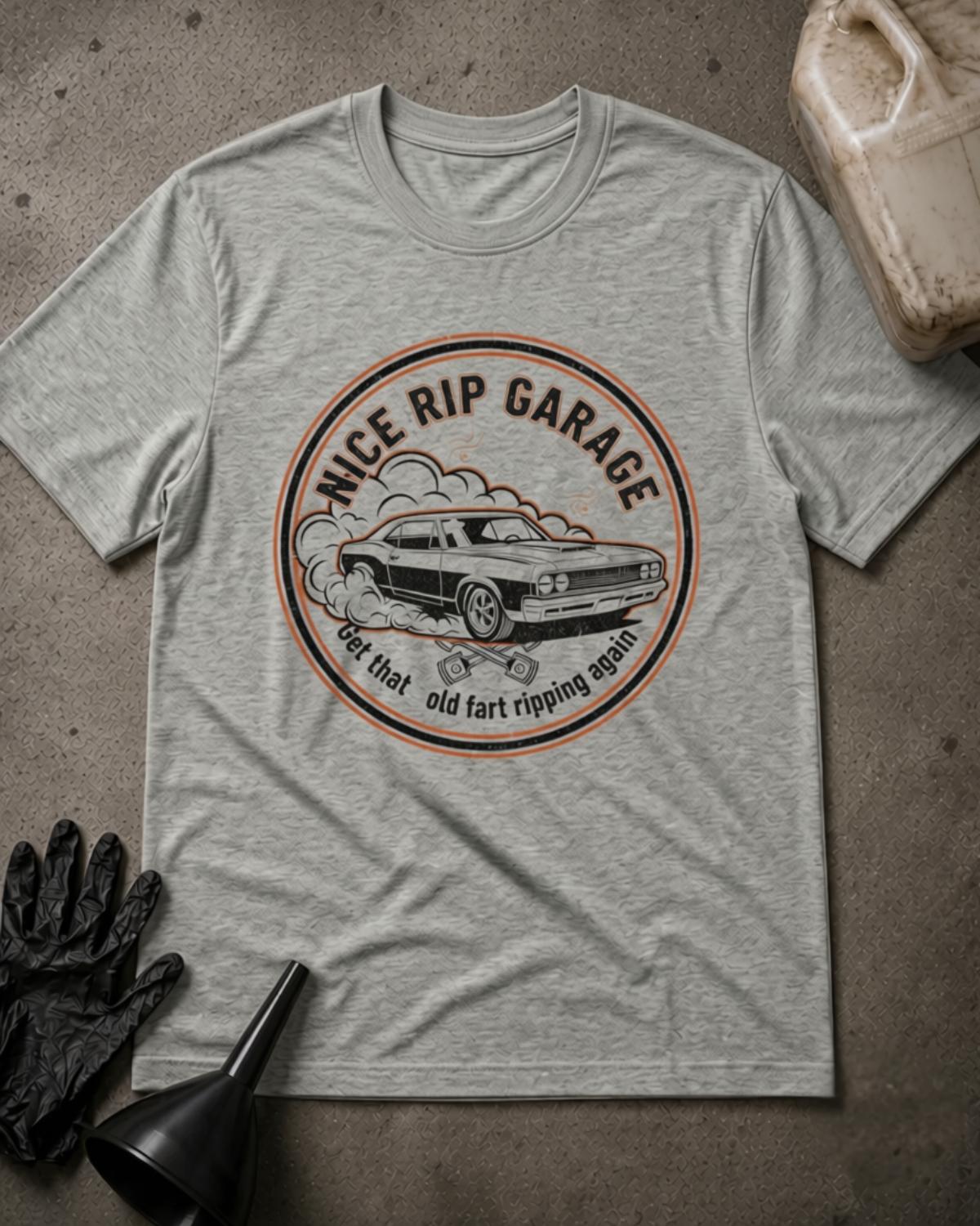Athletic Heather gray Nice Rip Garage drag racing T-shirt featuring a circular emblem with a classic muscle car, tire smoke, crossed pistons, and “Get that old fart ripping again.”