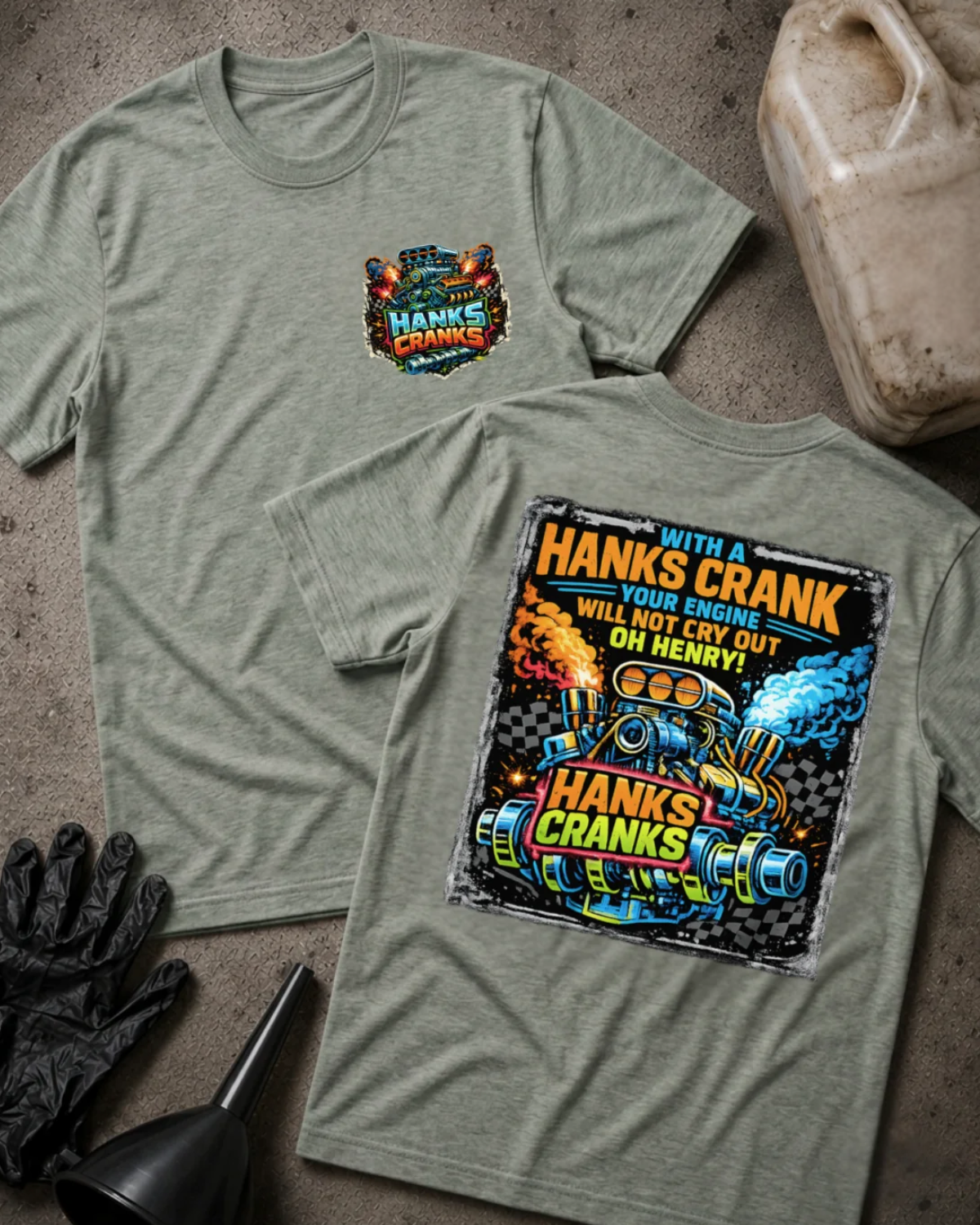 Front and back of athletic heather grey Hanks Cranks T-shirt with a small engine chest emblem and colorful racing engine and crankshaft back graphic with checkered flags, orange flames and blue smoke.