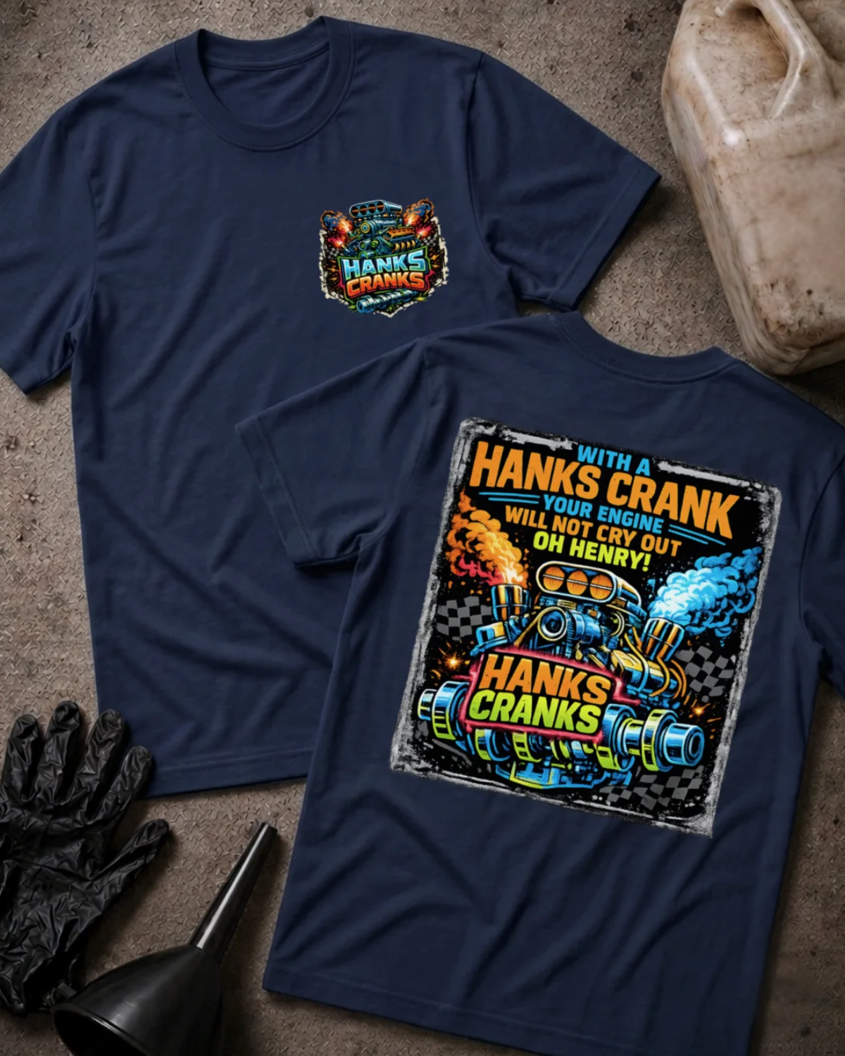 Front and back of navy Hanks Cranks T-shirt with a small engine chest emblem and colorful racing engine and crankshaft back graphic with checkered flags, orange flames and blue smoke.