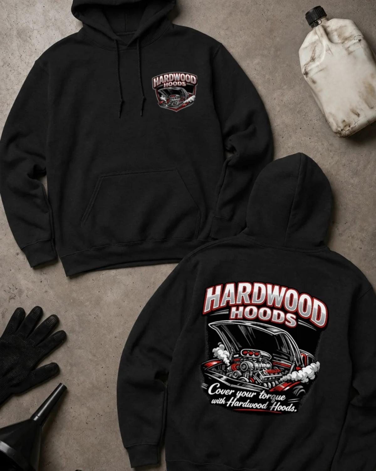 Front and back of black Hardwood Hoods hoodie with a chest emblem and raised car hood revealing a supercharged racing engine, reading “Cover Your Torque with Hardwood Hoods.”