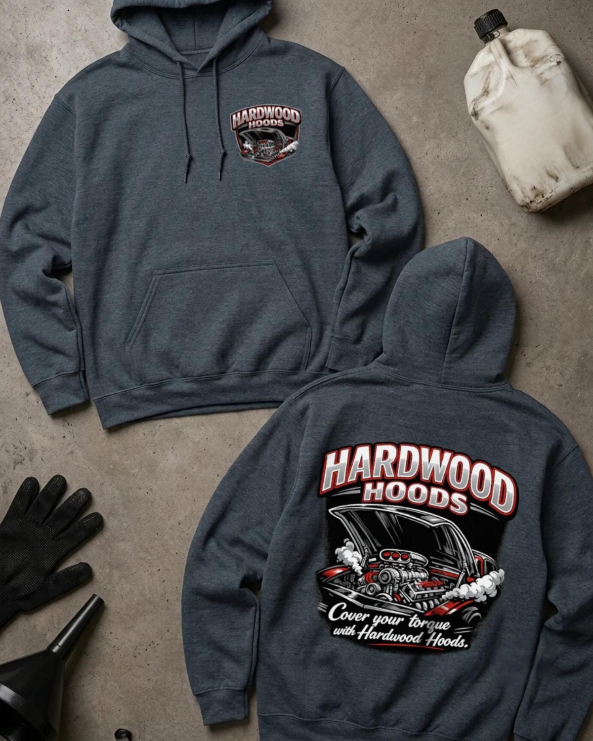 Front and back of dark heather Hardwood Hoods hoodie with a chest emblem and raised car hood revealing a supercharged racing engine, reading “Cover Your Torque with Hardwood Hoods.”