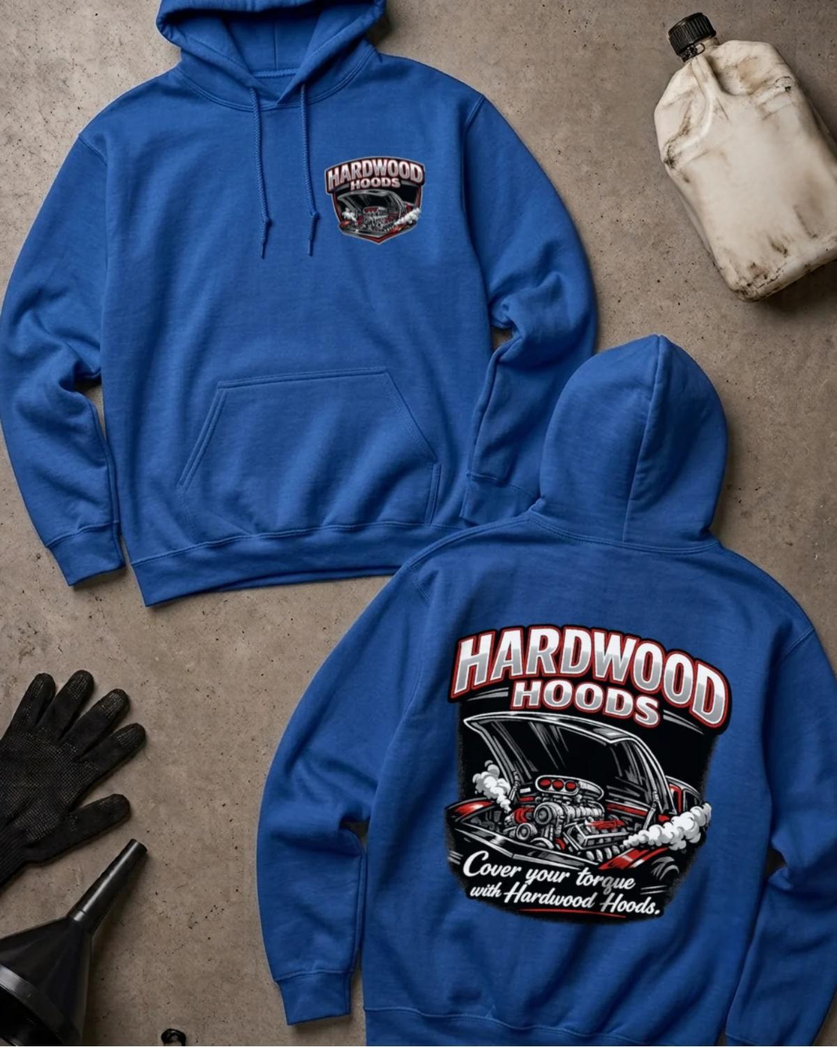 Front and back of royal blue Hardwood Hoods hoodie with a chest emblem and raised car hood revealing a supercharged racing engine, reading “Cover Your Torque with Hardwood Hoods.”