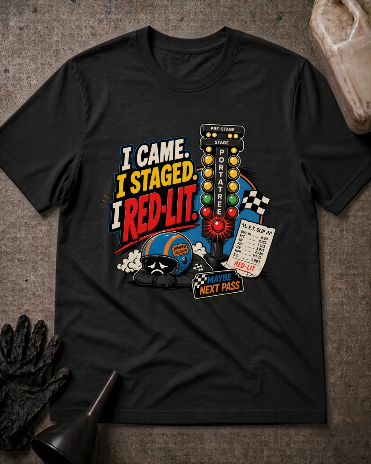  Front of black T-shirt with a red-lit drag racing starting tree and sad helmeted racer, reading “I Came. I Staged. I Red-Lit.”