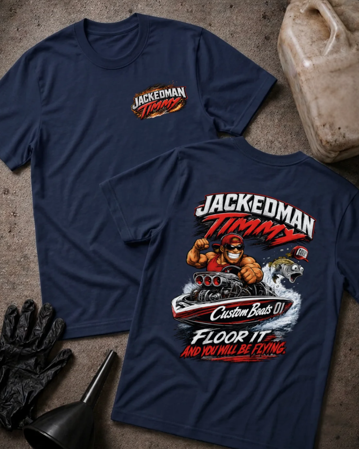 Front and back of navy Jackedman Timmy T-shirt with a chest logo and cartoon muscular driver in a drag racing boat beside a leaping fish on the back.