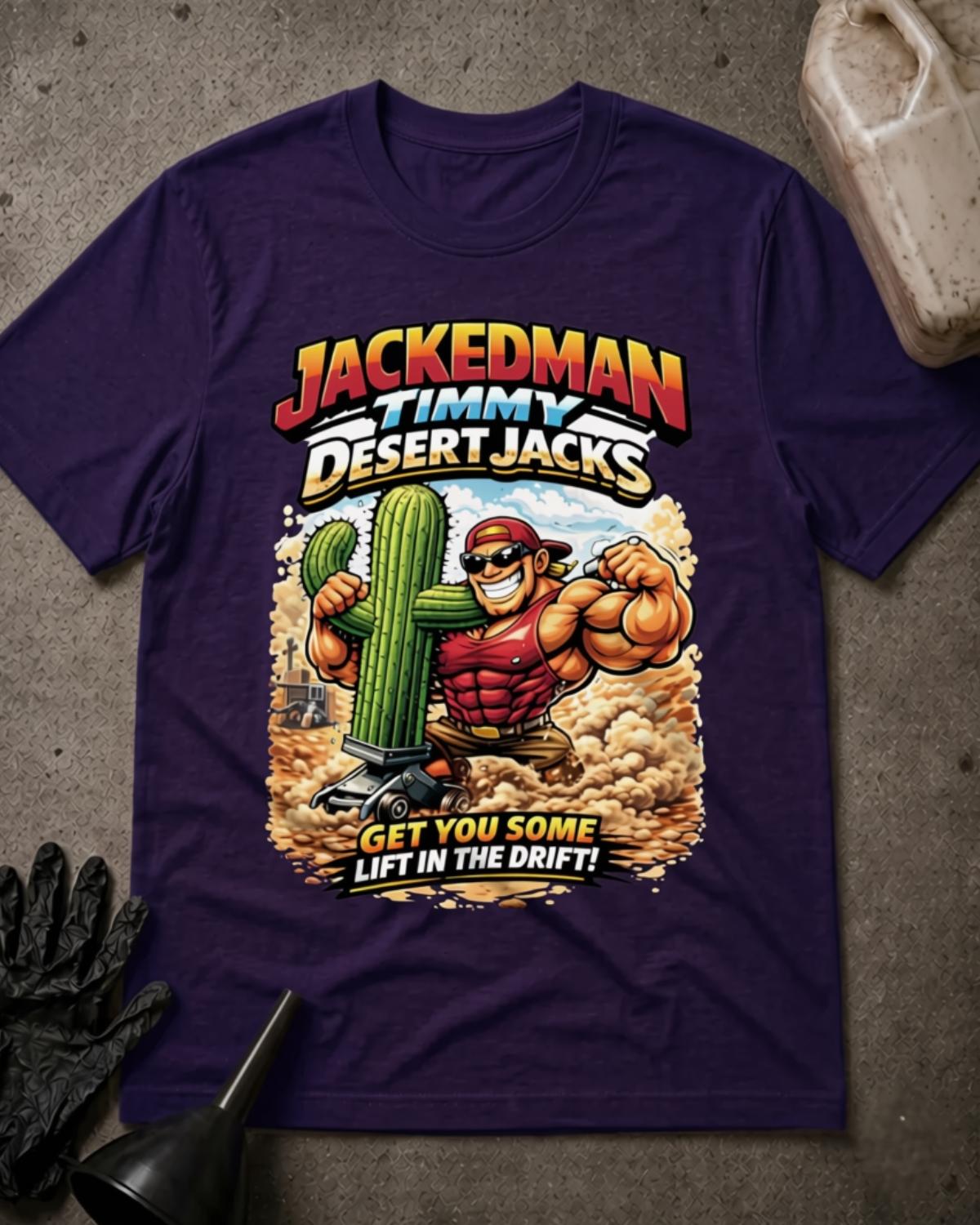 Team Purple Jackedman Timmy Desert Jacks T-shirt featuring a muscular cartoon man in sunglasses beside a cactus on a floor jack, with a dusty desert background and “Get you some lift in the drift!”⠋