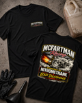 Front and back of black McFartman Racing T-shirt with a chest logo and grinning turbocharger amid flames and smoke, reading “Powered by Nitromethane & Bad Decisions.”