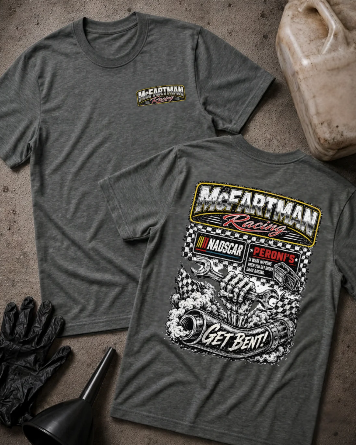 Front and back of dark grey heather McFartman Racing T-shirt with a chest logo and skeletal hand holding a wrench above a bent exhaust pipe, checkered flags and “Get Bent!” text.