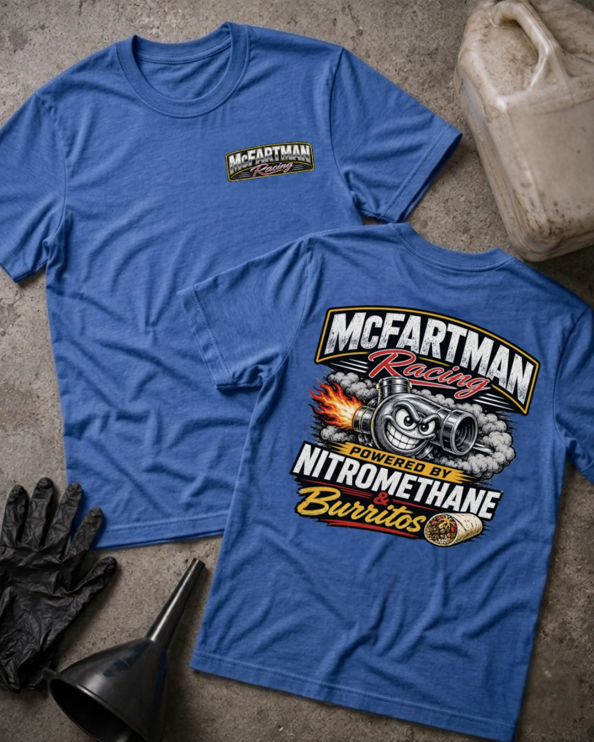 Front and back of heather true royal blue McFartman Racing T-shirt with a chest logo and grinning turbocharger, flames, smoke and burrito, reading “Powered by Nitromethane & Burritos.”