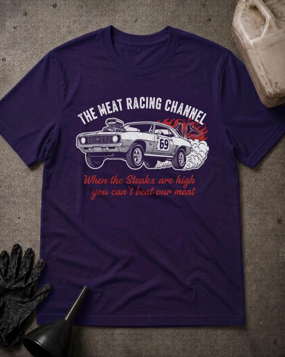 Team Purple Meat Racing Channel T-shirt featuring a supercharged muscle car numbered 69, tire smoke, a flaming steak, and the slogan “When the steaks are high you can’t beat our meat.”