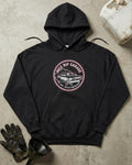 Front of black hoodie with a circular Nice Rip Garage logo featuring a classic muscle car amid tire smoke and “Get That Old Fart Ripping Again” text.