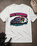 Front of white Paul Trunnions T-shirt with pink lettering above a supercharged drag car with pink, blue and lime flame graphics amid white tire smoke.