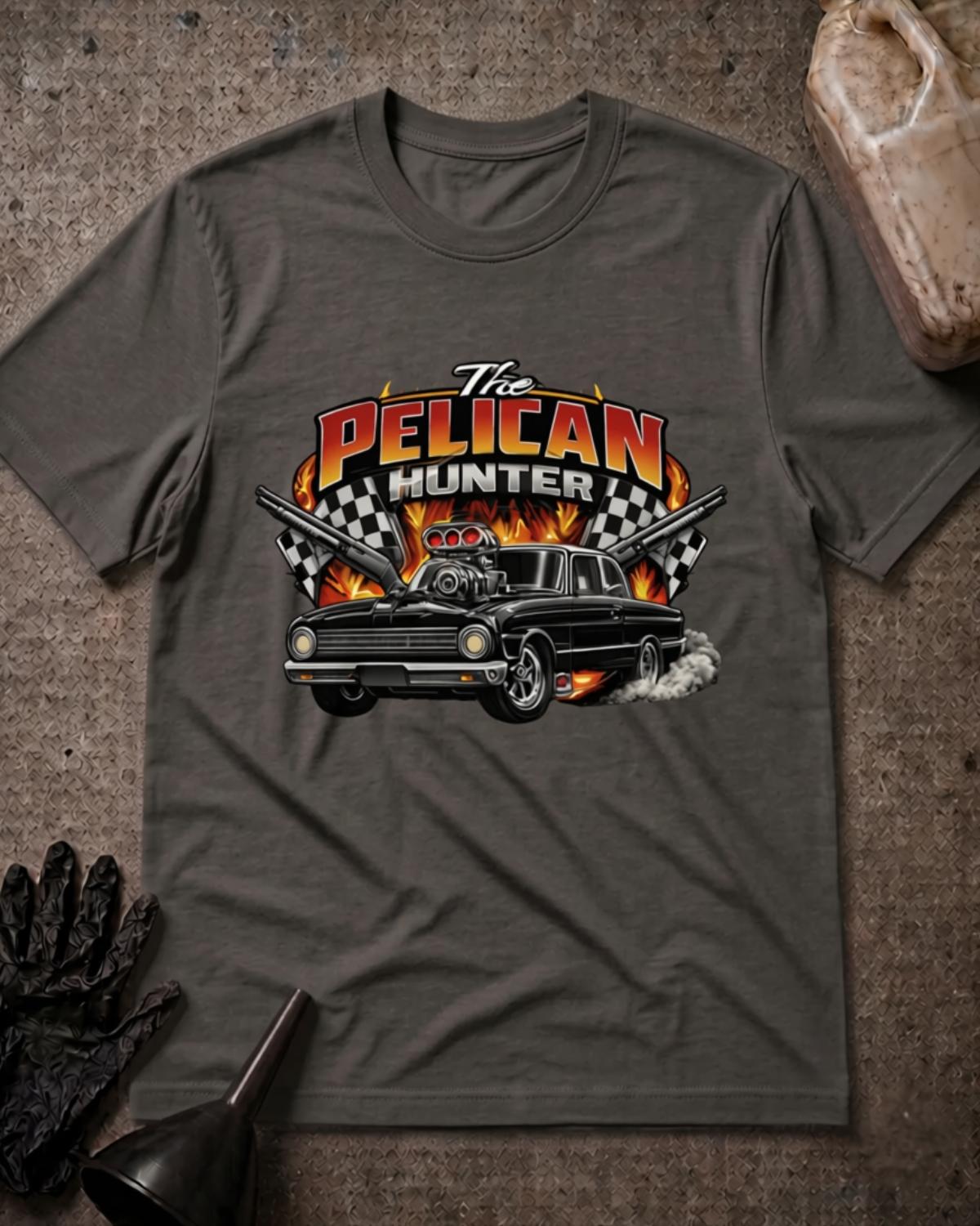 Asphalt gray Pelican Hunter drag racing T-shirt featuring a black supercharged muscle car, tire smoke, flames, checkered flags, crossed shotguns, and “The Pelican Hunter” lettering.