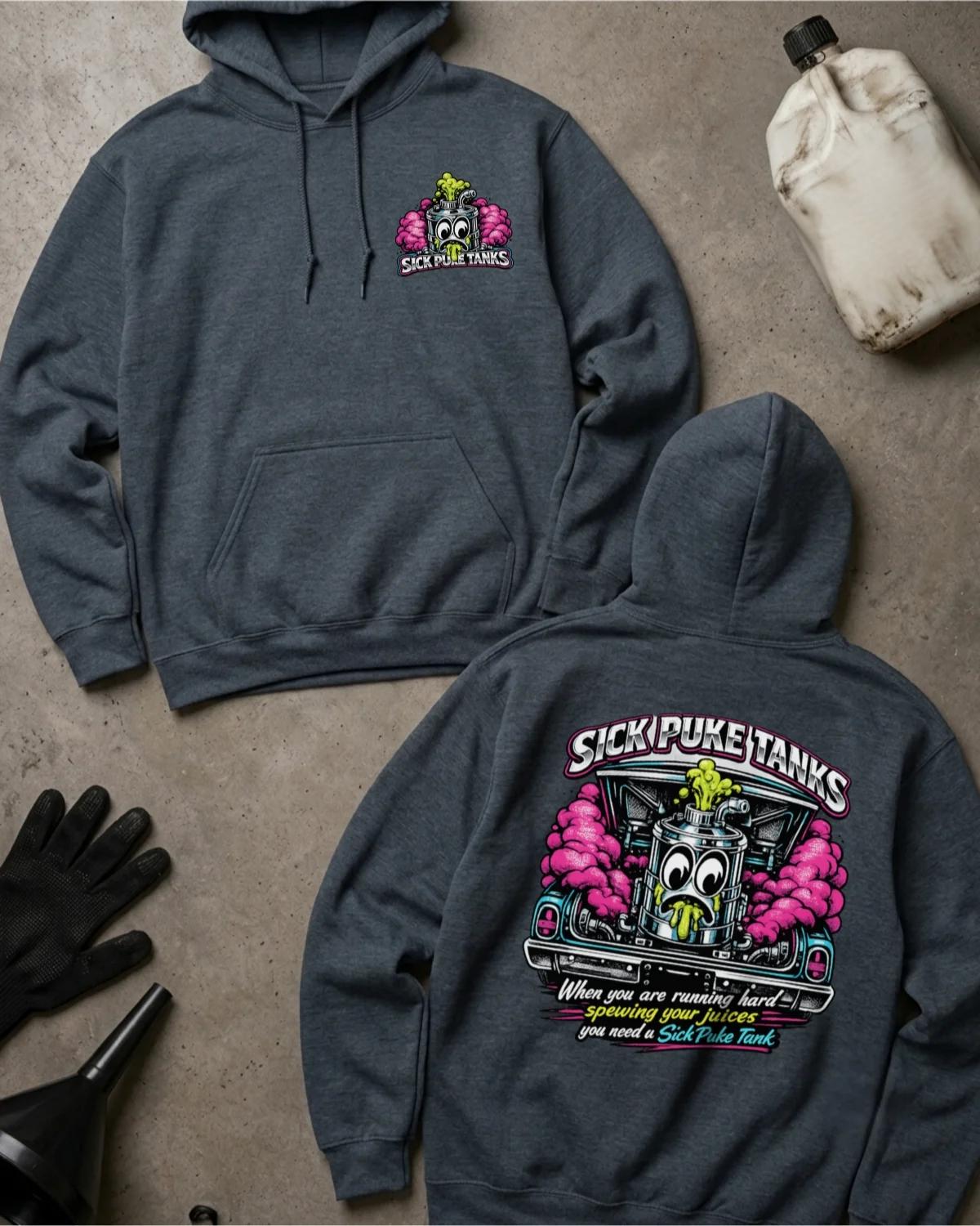 Front and back of dark heather Sick Puke Tanks hoodie with a chest emblem and cartoon automotive catch tank spewing green fluid amid pink smoke beneath an open car hood.
