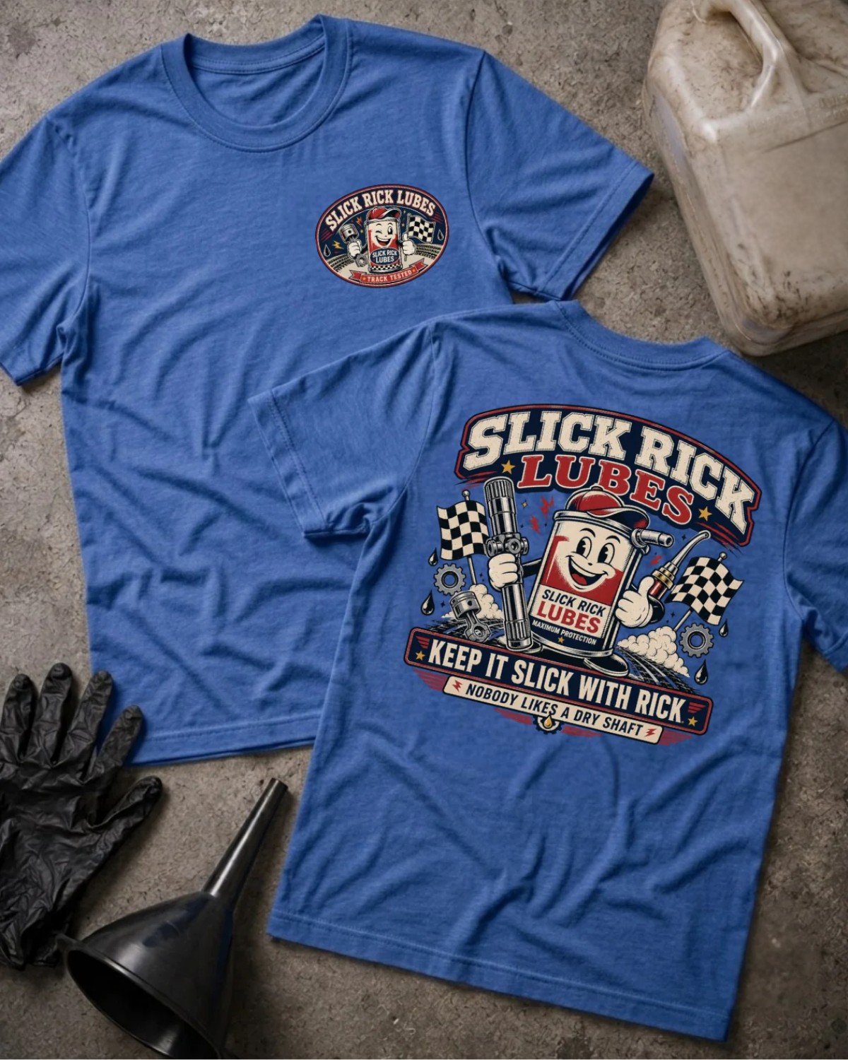 Front and back of heather true royal blue Slick Rick Lubes T-shirt with a chest logo and cartoon automotive oil can holding a splined shaft and oil nozzle, reading “Keep It Slick with Rick.”