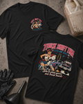 Front and back of black Thick Shift Tina T-shirt with a small chest emblem and back graphic of a pinup mechanic beside an oversized gear shifter and drag car.