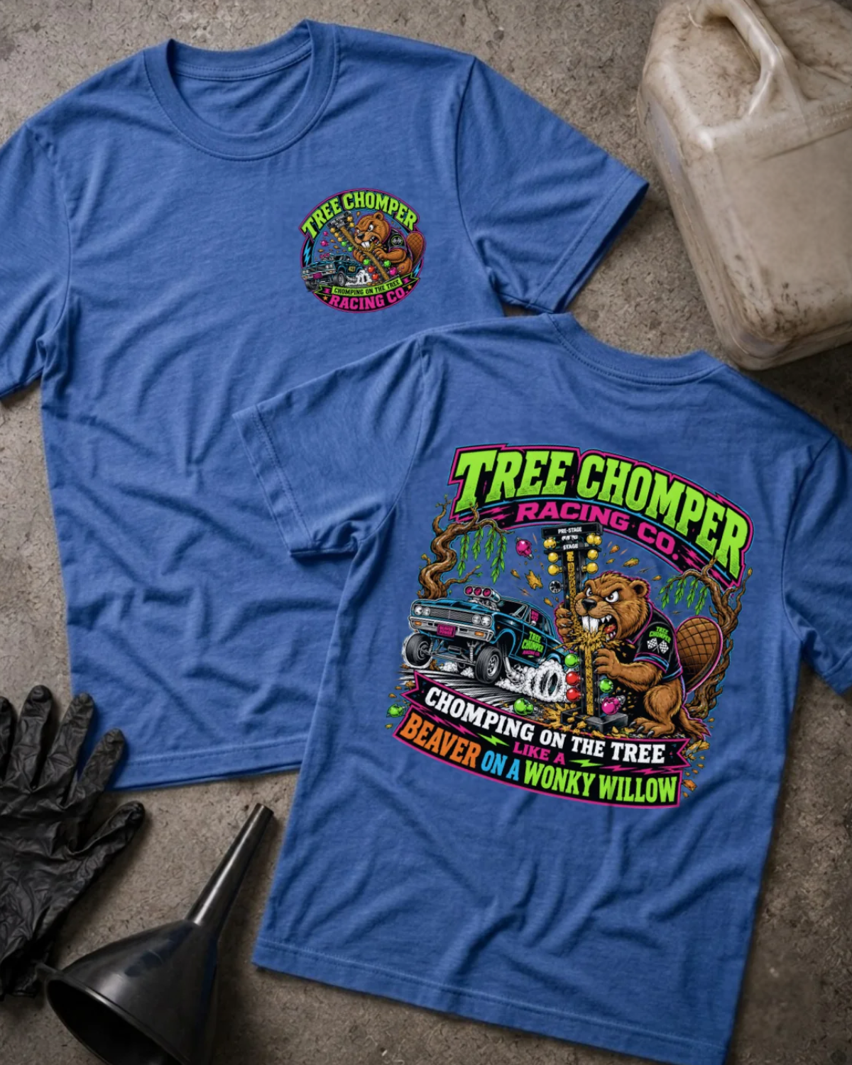 Front and back of heather true royal blue Tree Chomper Racing Co. T-shirt with a small chest emblem and beaver chewing a drag racing starting tree beside a drag car on the back.
