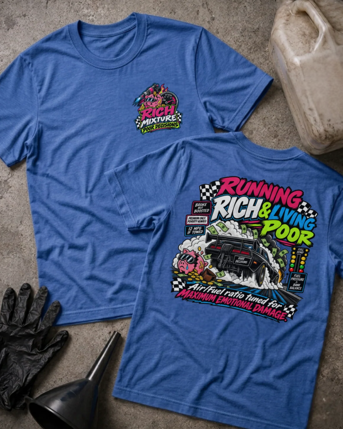 Front and back of Running Rich & Living Poor heather true royal T-shirt with chest logo, drag car amid smoke and flying cash, and “Air/fuel ratio tuned for maximum emotional damage” slogan.