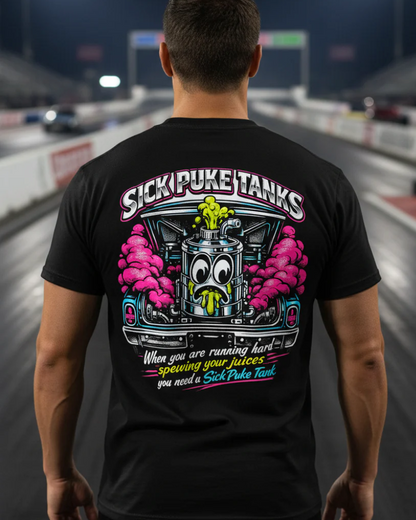Man wearing a black Bella+Canvas 3001 t-shirt with a colorful graphic design and 'Sick Puke Tanks When you are running hard spewing your juices you need a Sick Puke Tank' text on back standing on a drag strip