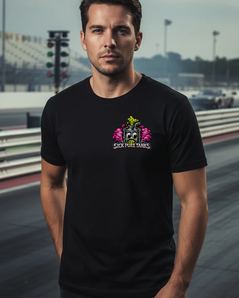 Man wearing a black t-shirt with a colorful 'Sick Puke Tanks' logo standing on a drag strip