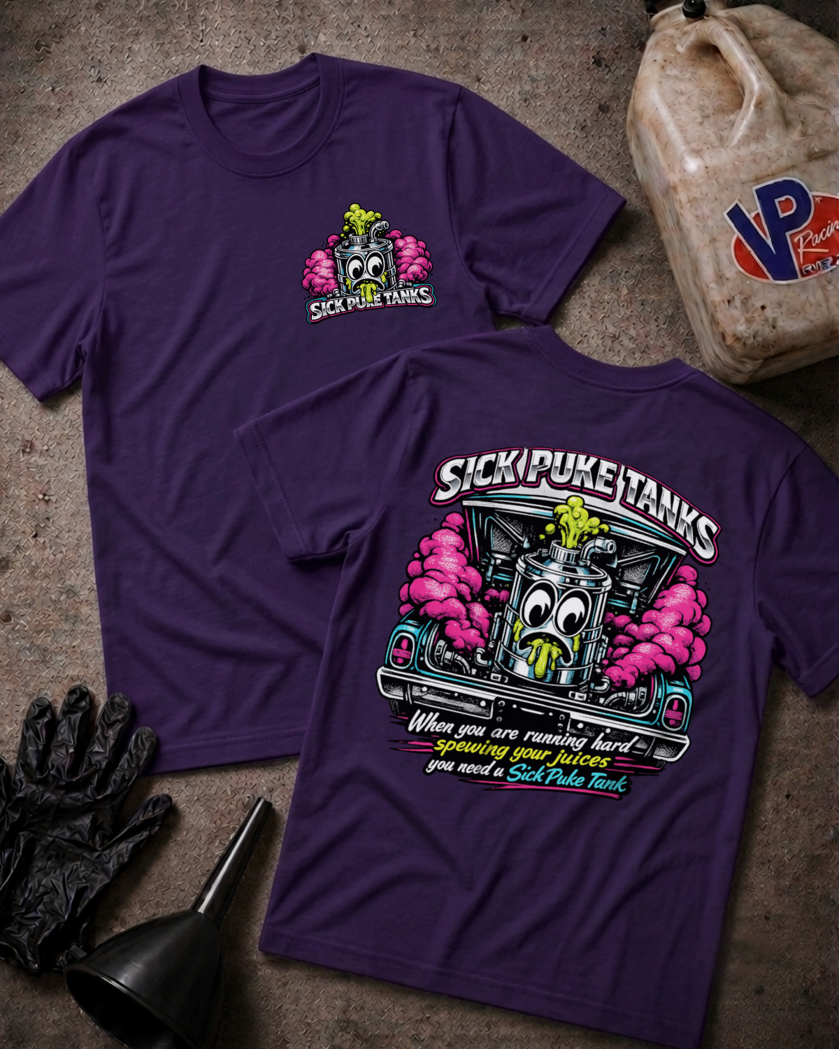 Two purple graphic T-shirts laid flat on a textured surface, showing the front and back designs. The shirts feature a cartoon tank character with pink smoke and the text 'SICK PUKE TANKS'.