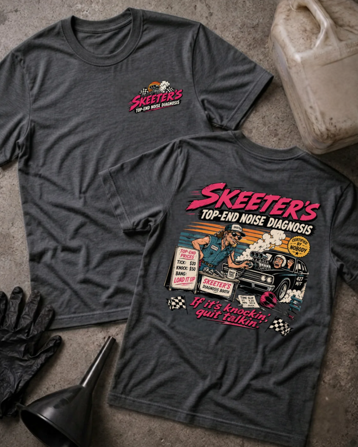 Front and back of Skeeter’s Top-End Noise Diagnosis dark grey heather T-shirt with chest logo, mechanic examining a smoking muscle car engine, and “If it’s knockin’, quit talkin’” slogan.