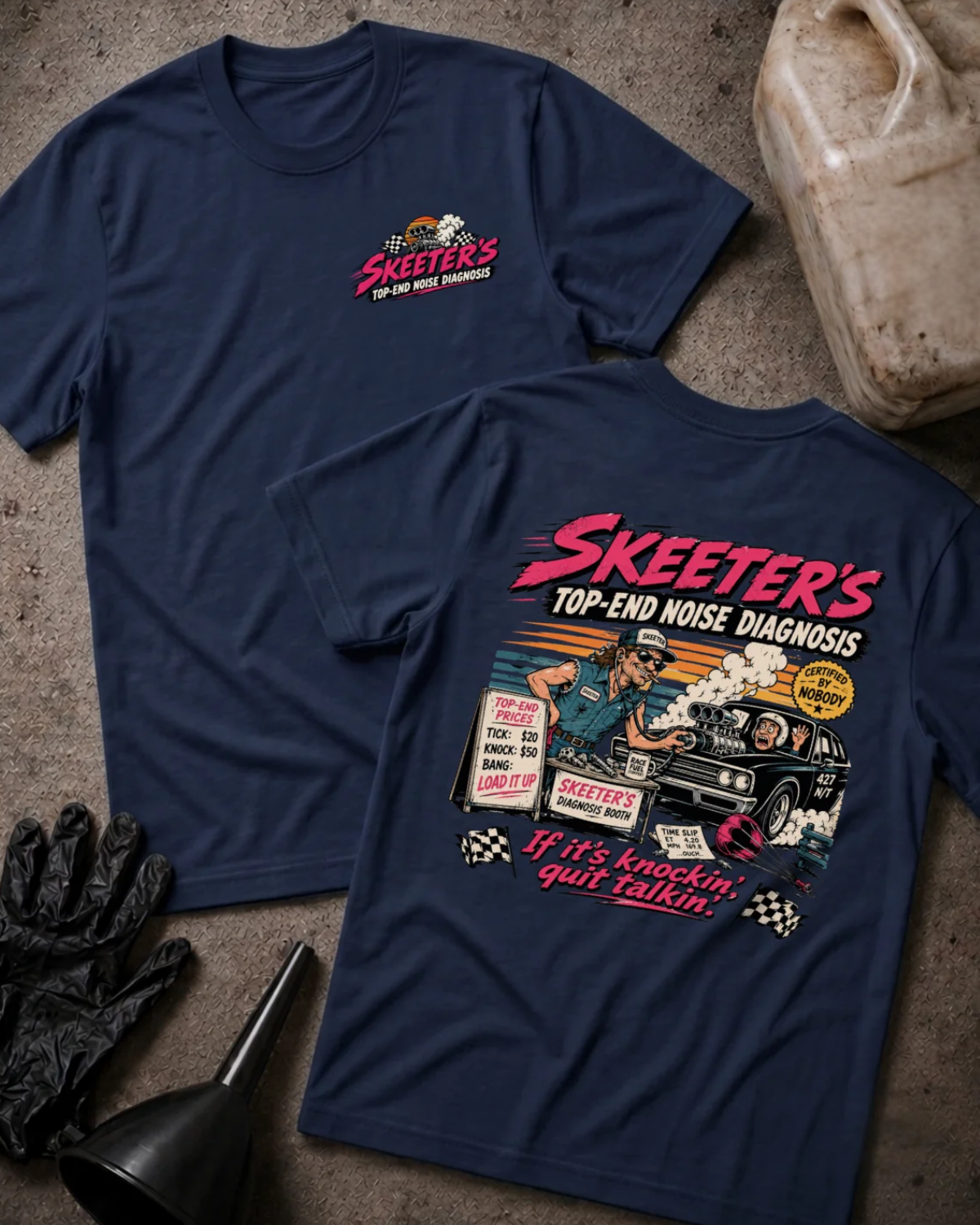 Front and back of Skeeter’s Top-End Noise Diagnosis navy T-shirt with chest logo, mechanic examining a smoking muscle car engine, and “If it’s knockin’, quit talkin’” slogan.