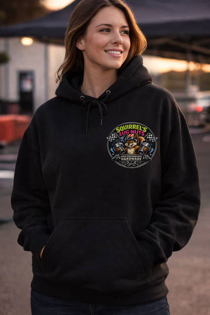 Woman wearing a black hoodie with a 'Squirrel's Lug Nuts' logo on the front standing in the pit crew area at a drag race