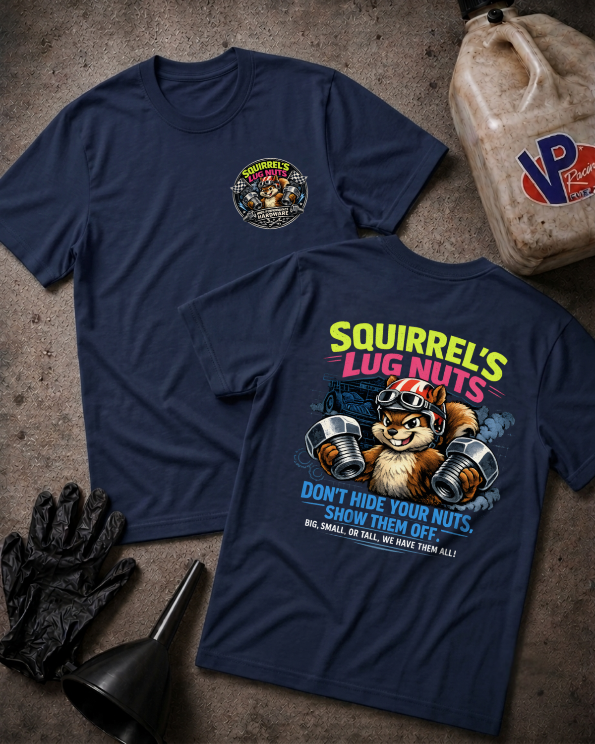 Two navy blue graphic t-shirts displayed flat on a textured gray surface, surrounded by black gloves, a black funnel, and a plastic jerrycan. The front shirt features a small circular 'Squirrel's Lug Nuts' logo on the left chest.