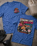 Front and back of Staging Lane Sally’s heather true royal T-shirt with chest logo, woman holding a stopwatch seated on a racing tire, and “For racers who leave on eventually” slogan.