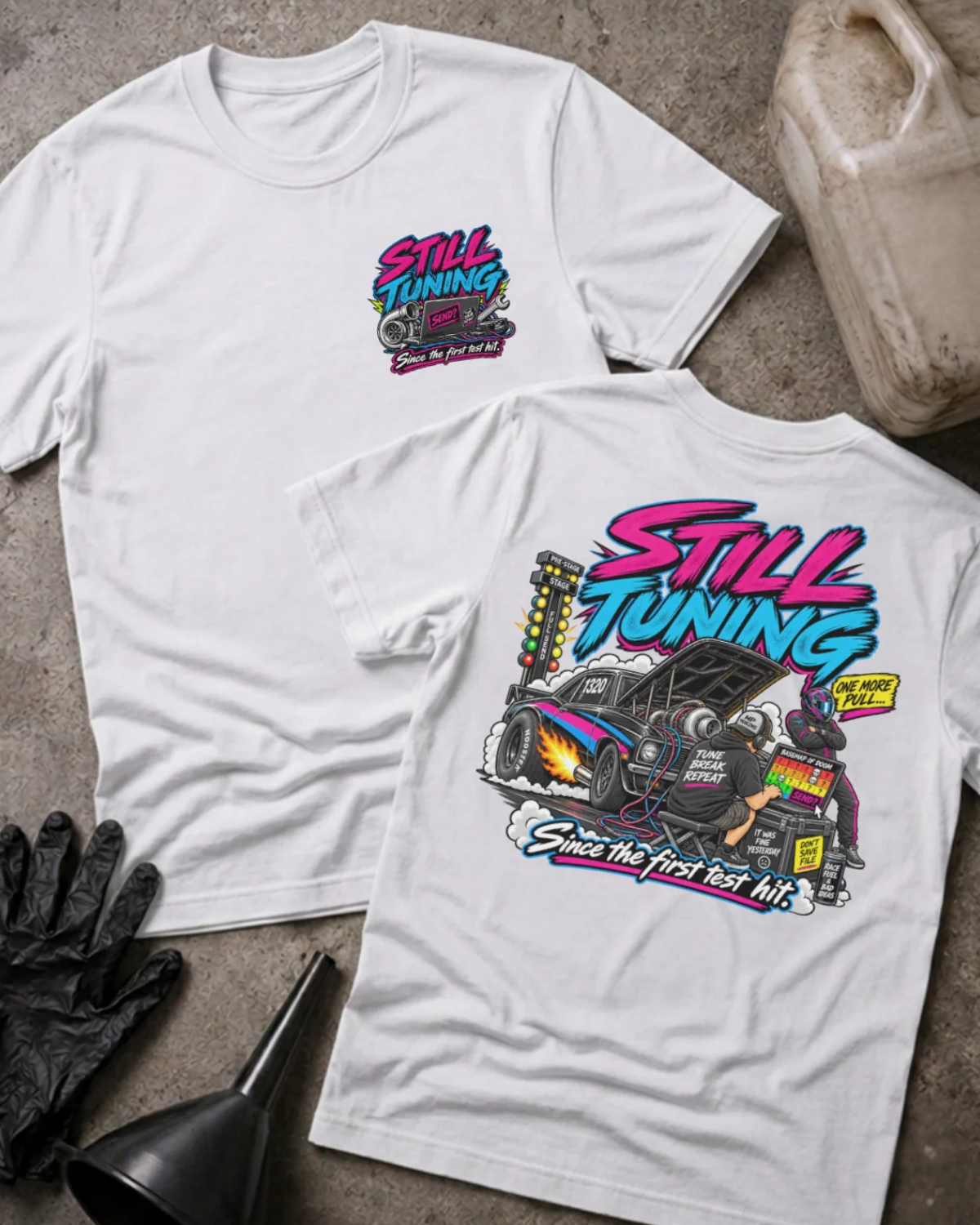 Front and back of Still Tuning white T-shirt with chest logo, mechanic using a laptop beside a drag car with open hood, and “Since the first test hit” slogan.⠋