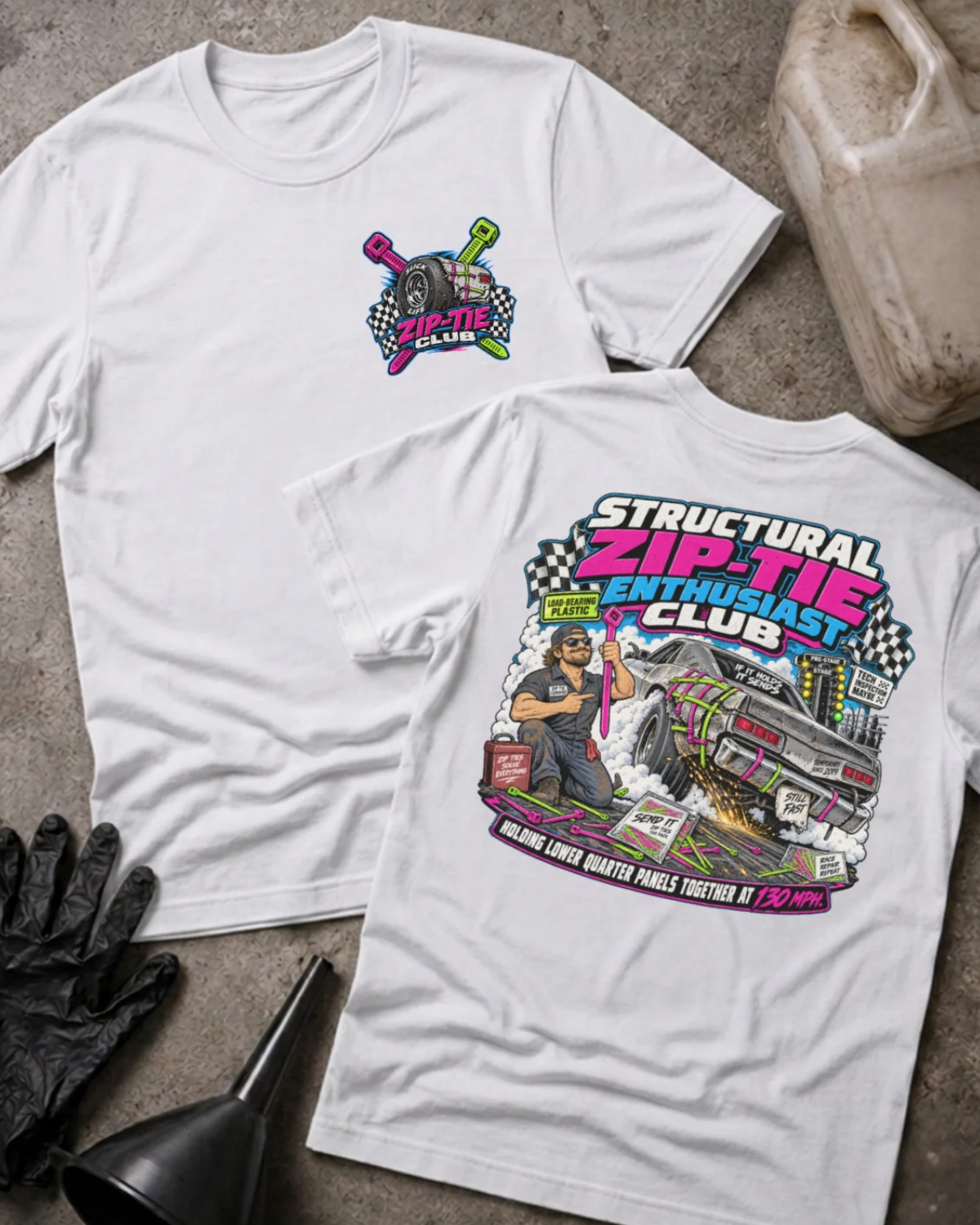 Front and back of Structural Zip-Tie Enthusiast Club white T-shirt with chest logo, mechanic holding a pink zip tie, and drag car secured with colorful zip ties.