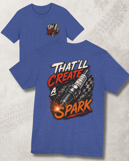Heather true royal t-shirt with graphic design and "That'll create a spark' text on a textured surface