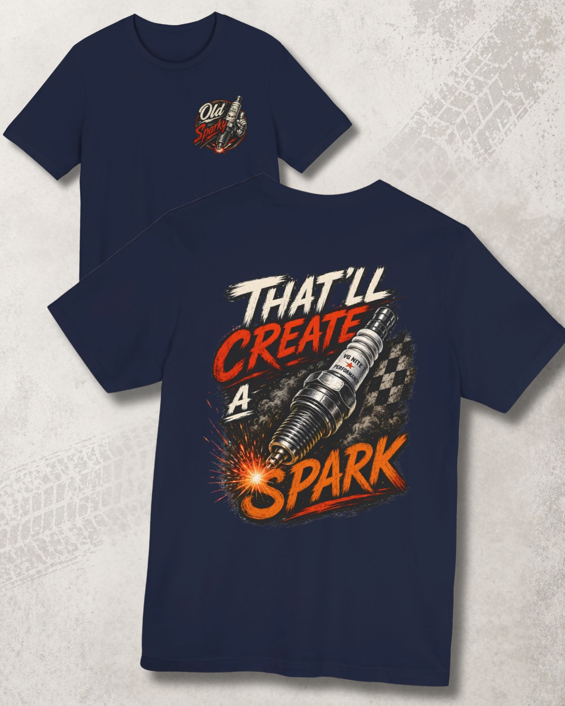 Navy blue t-shirt with graphic design and 'That'll create a spark' text on a textured gray background