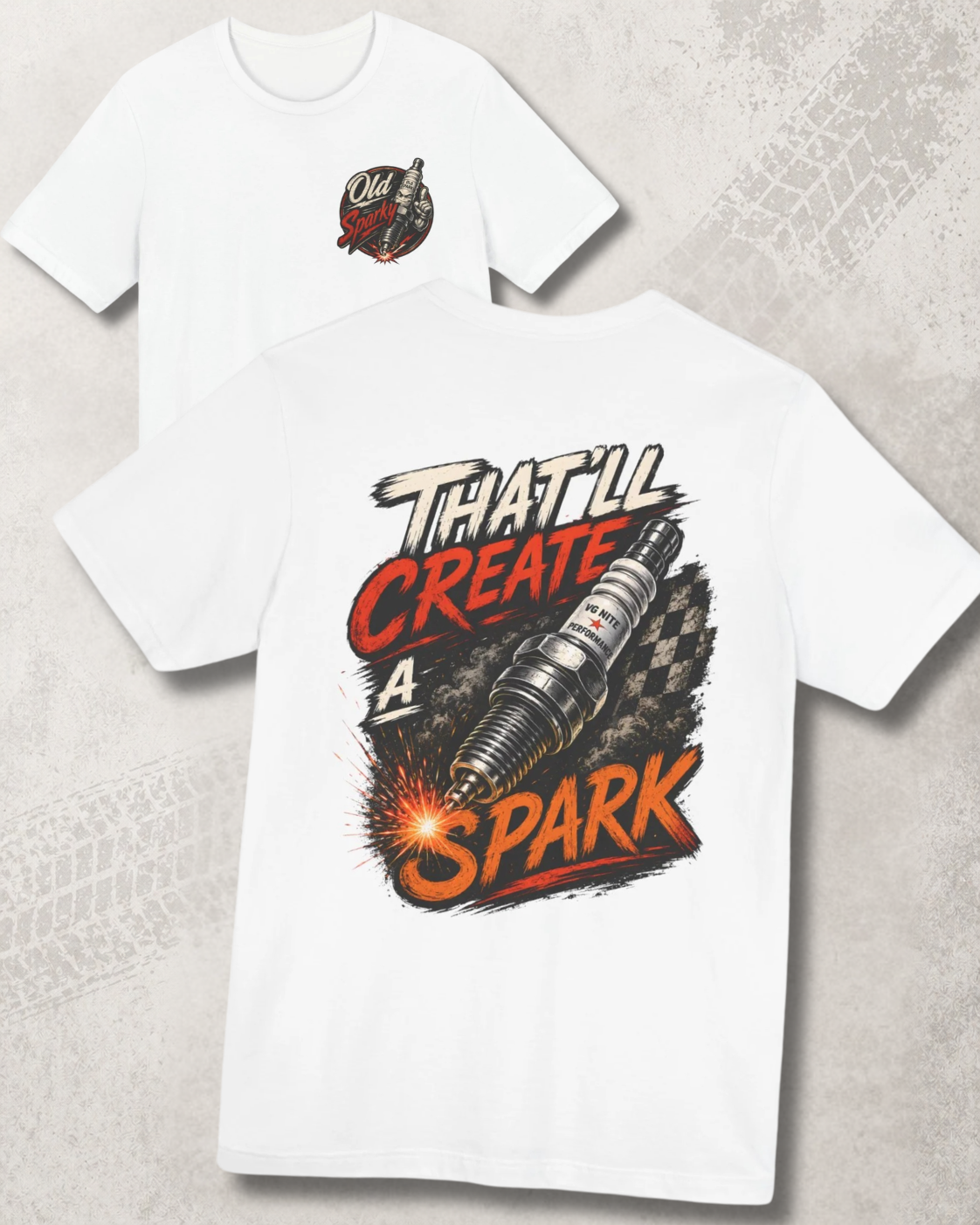 White t-shirt with graphic design and 'That'll create a spark' text on a textured surface
