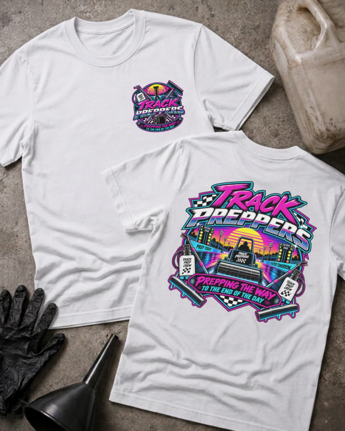 Front and back of Track Preppers white T-shirt with chest logo, track preparation equipment against a neon sunset, and “Prepping the way to the end of the day” slogan.