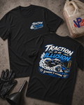 Traction Is An Illusion t-shirt in black showing front chest logo and bold back print of a spinning drag car with text 'Spinning Is Winning (Technically)'