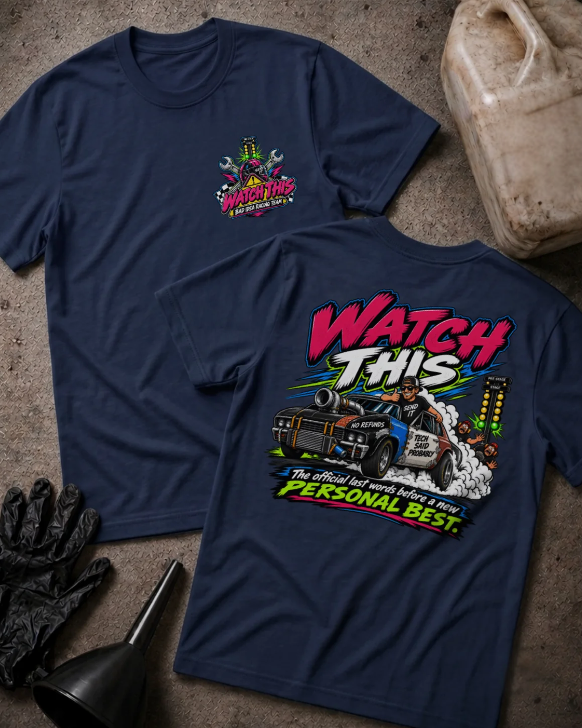 Front and back of Watch This navy T-shirt with chest logo, turbocharged drag car beside staging lights, and “The official last words before a new personal best” slogan.